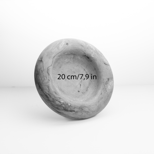 Gray marble-patterned ball with measurement text on a white background