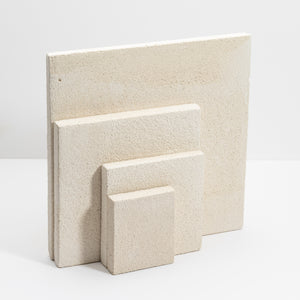 Set of stone tiles in various sizes on a white background
